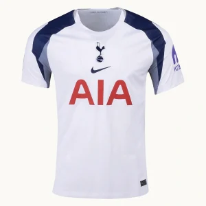 Tottenham Hotspur Home Kit 25/26, front view, Lilywhite jersey with Binary Blue sleeves, central crest, and ribbed crew neck collar.