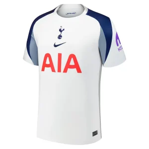 Tottenham Hotspur Home Kit 25/26, front view, Lilywhite jersey with Binary Blue sleeves, central crest, and ribbed crew neck collar.
